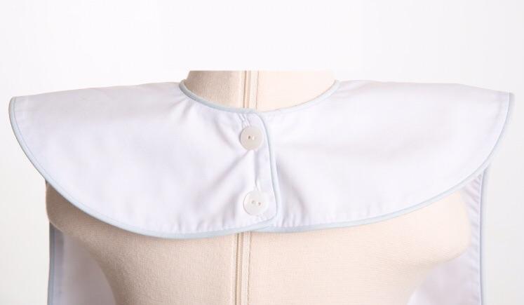 White Oversized Bib with Blue Piping